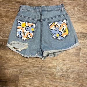 Art pocket denim shorts
